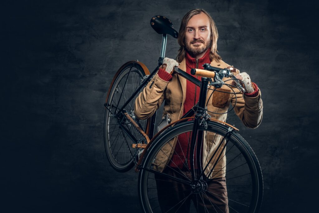 A Man Holds Fixed Bike .jpg
